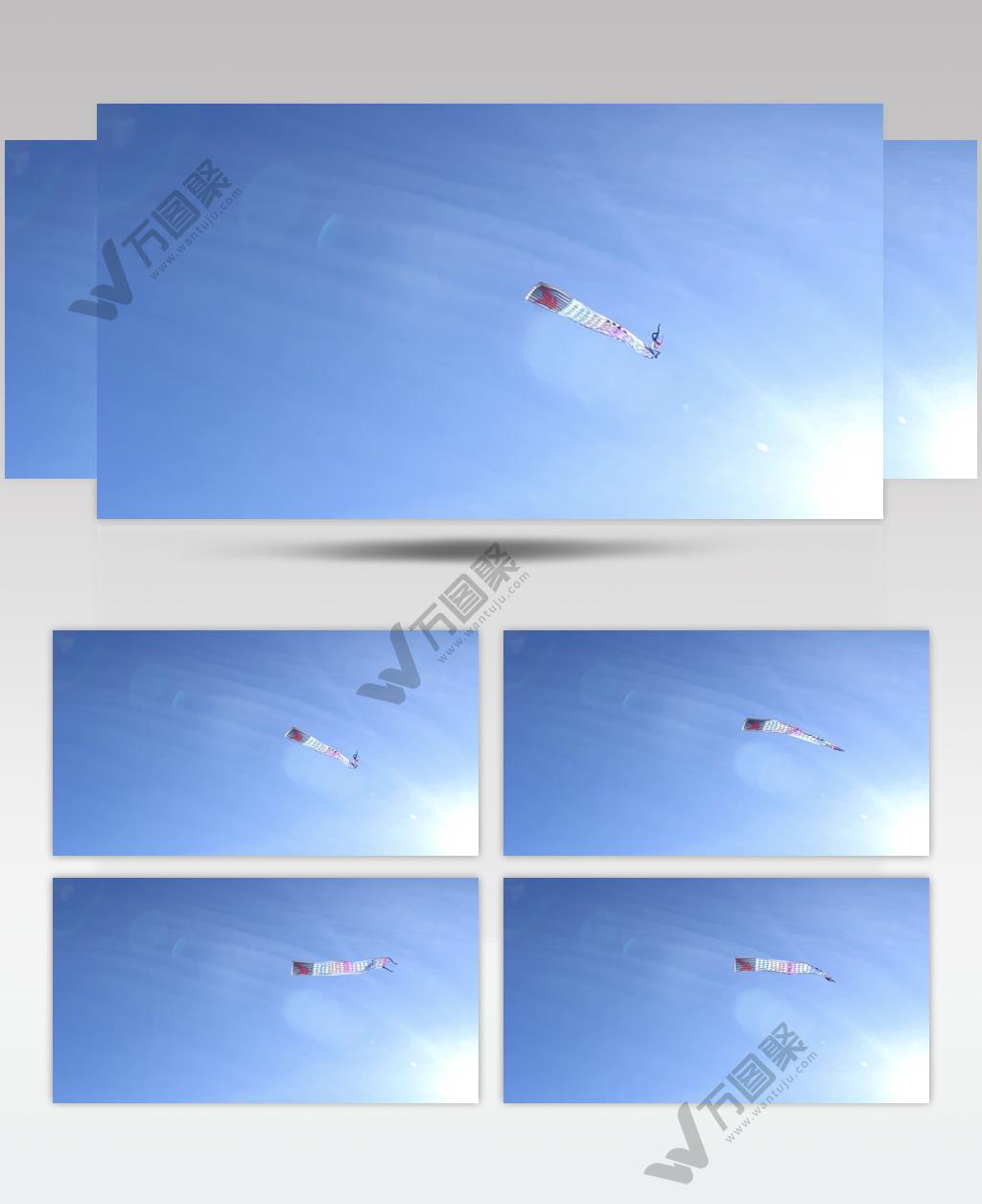 晴朗的天空下放风筝