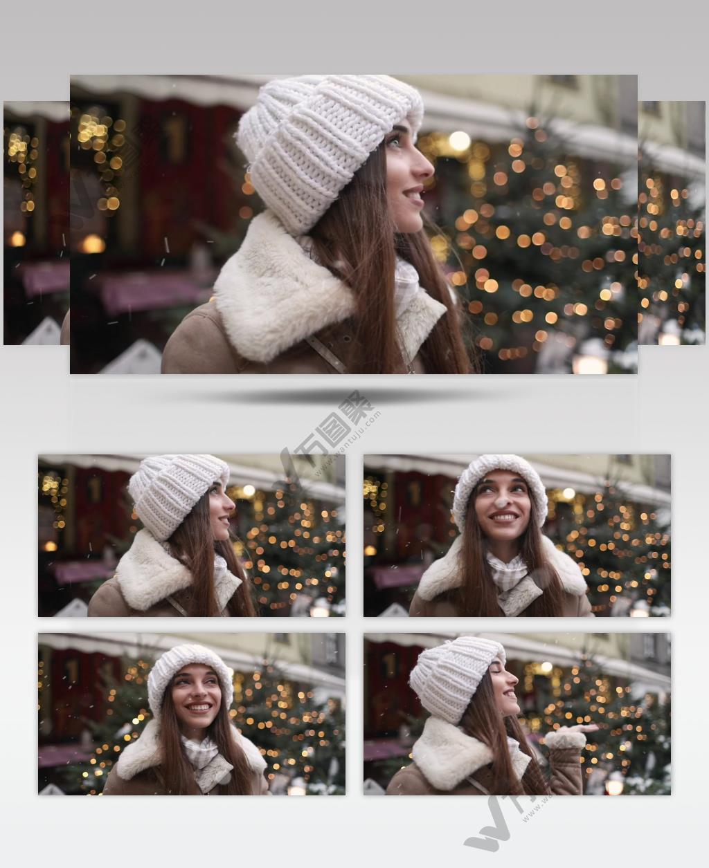 圣诞节的冬天下着雪花微笑的女人喜欢在街上散步张望
