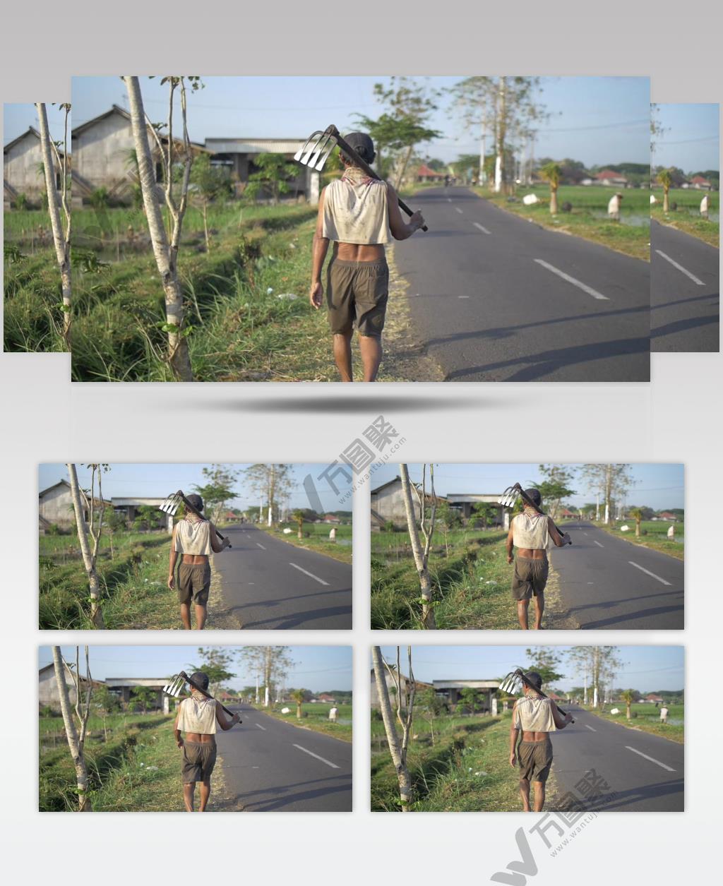 一名农场工人走过印尼农田后拍摄