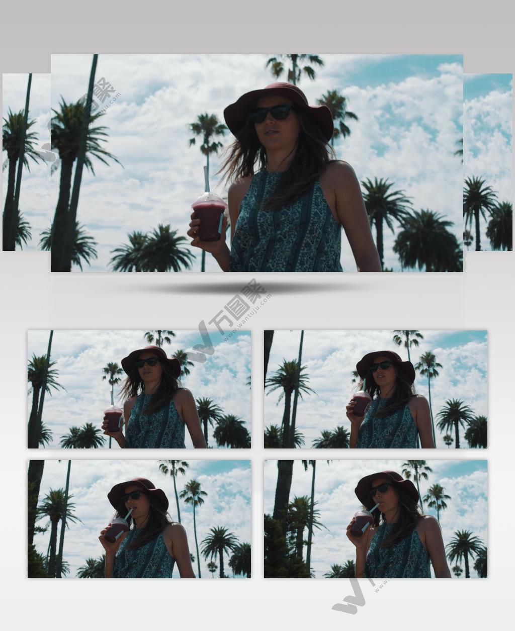 一个女孩在阳光明媚的夏日走在大街上，喝着冰镇的饮料