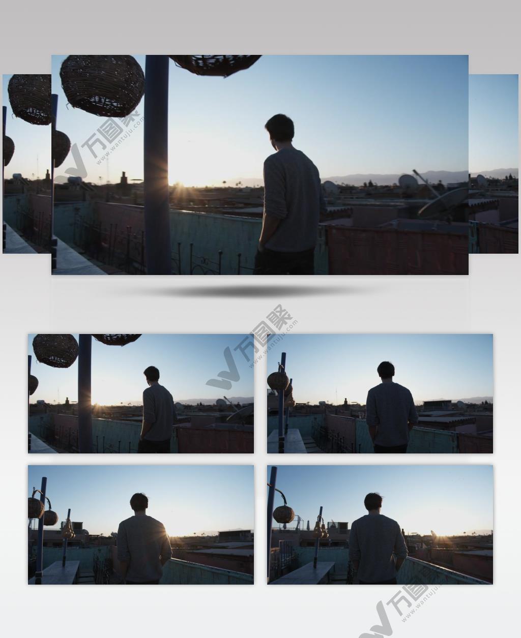 人走在屋顶上，可以看到日出的景色