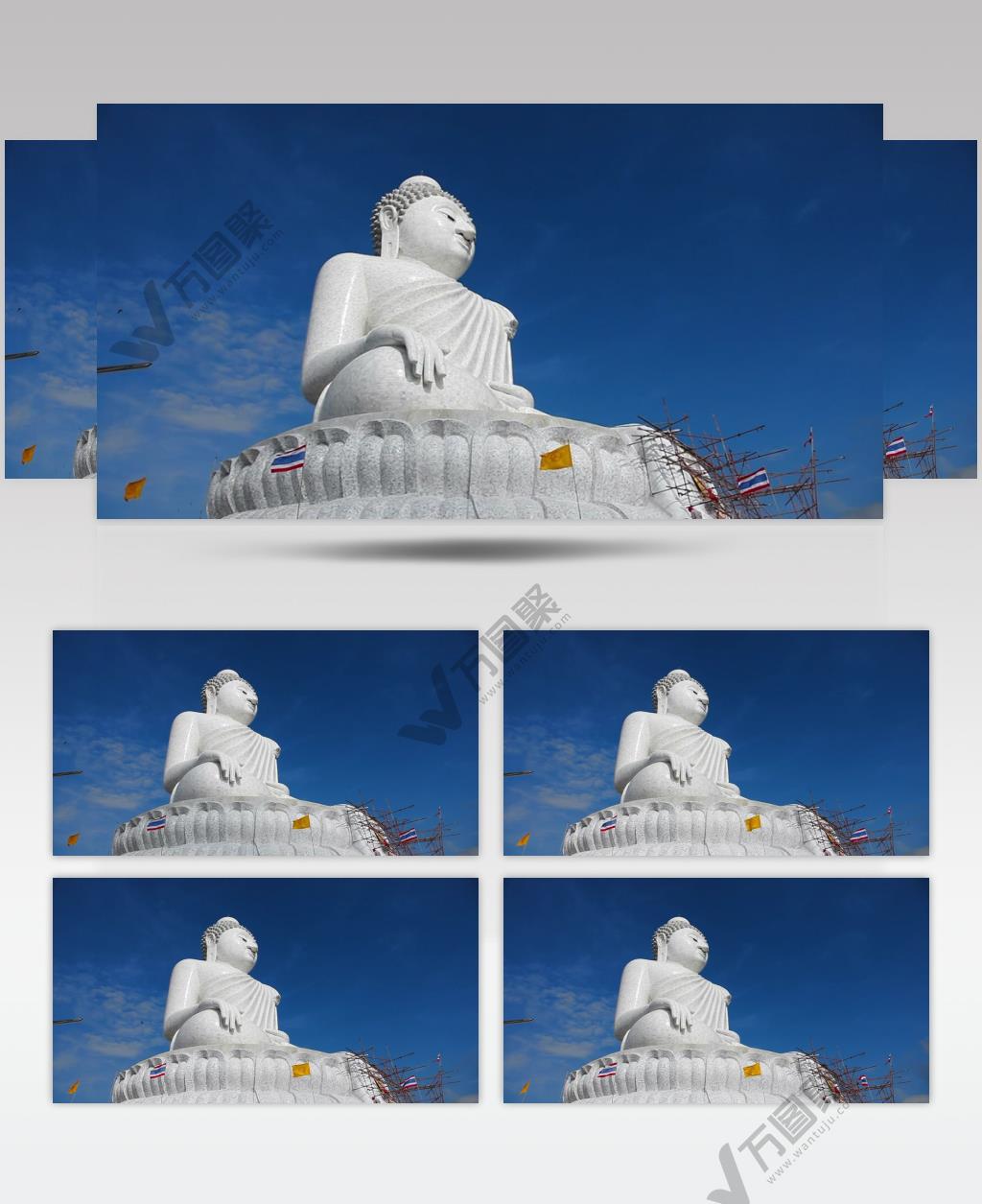 蓝天白云下巨大洁白的大佛雕像