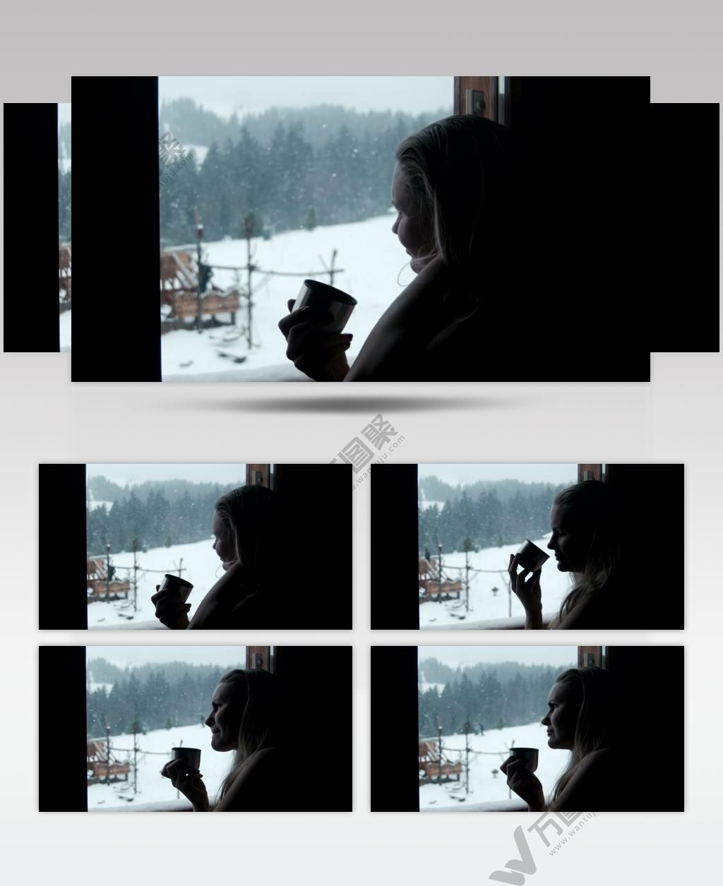 下雪天在窗边喝咖啡的女人