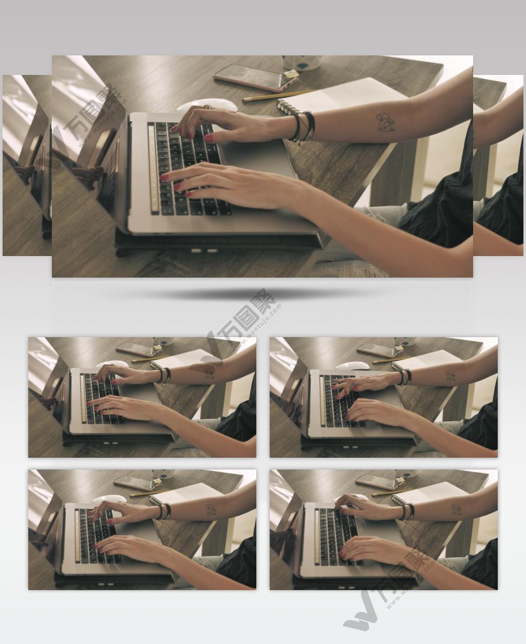 边工作边喝咖啡的女子