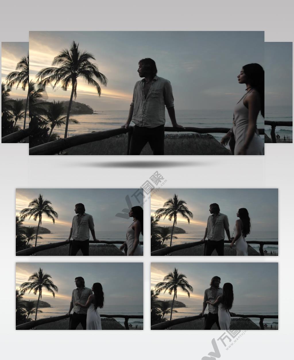 一对情侣站在海岸边望向大海