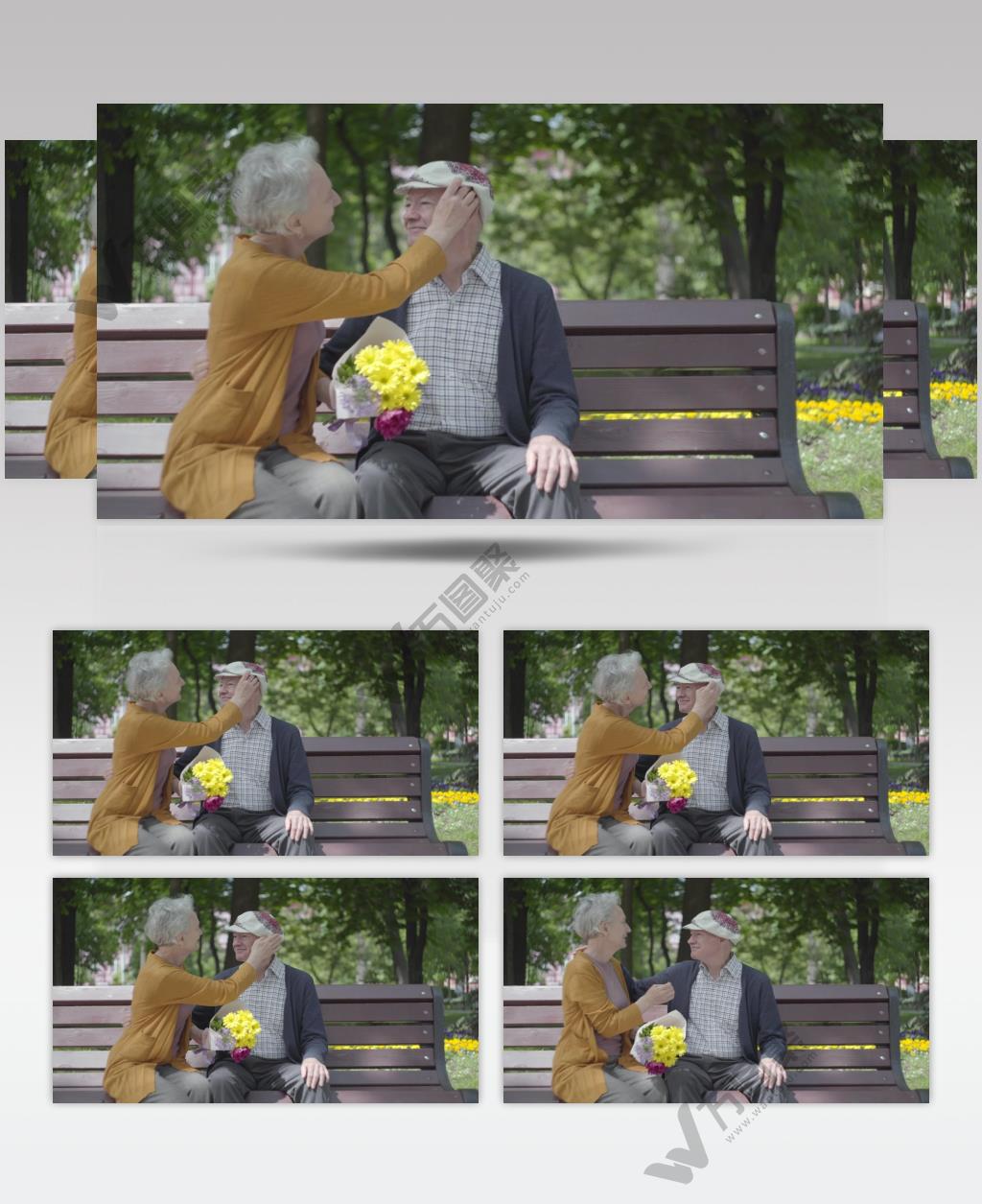 一对老夫妇坐在公园的长凳上