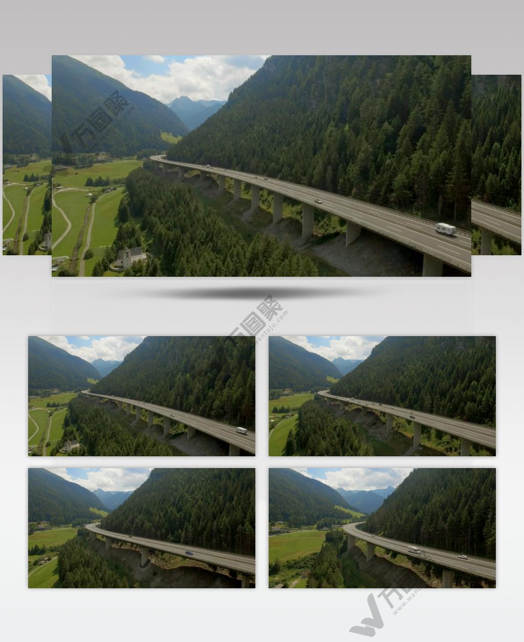 航拍山脉森林旁的沿山公路实拍视频