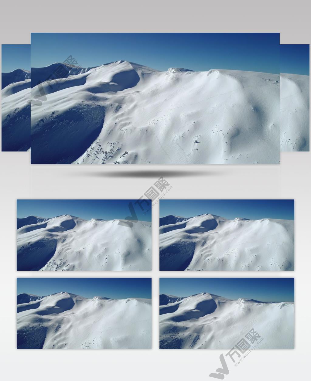 航拍蓝天下的雪山山脉实拍视频