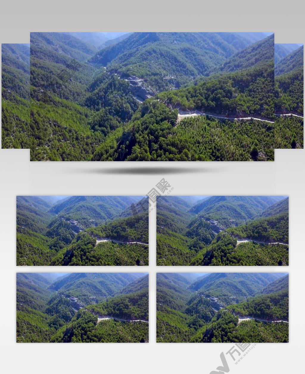 航拍山脉森林的蜿蜒小路实拍视频