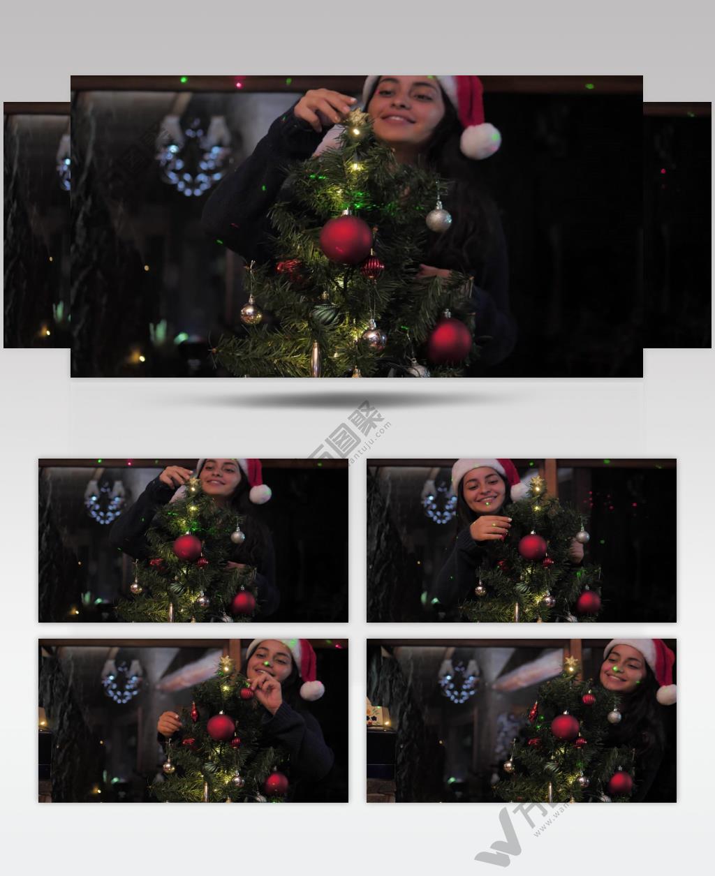 圣诞节小女孩在装饰圣诞树