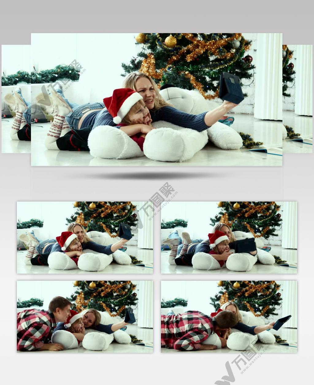 圣诞节欧美家庭一家人在圣诞树前自拍