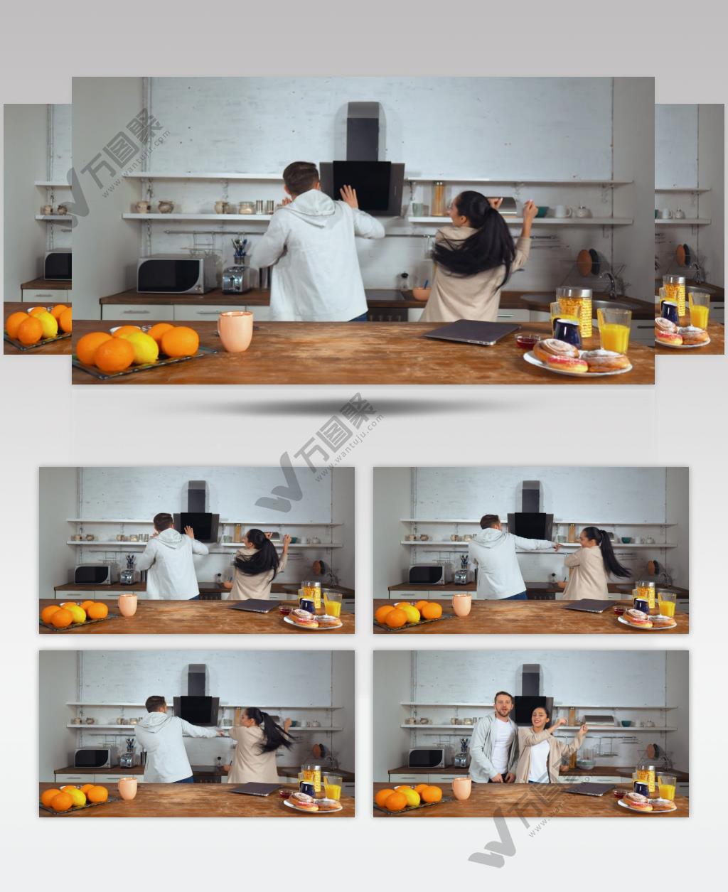 幸福的夫妇在厨房里跳舞