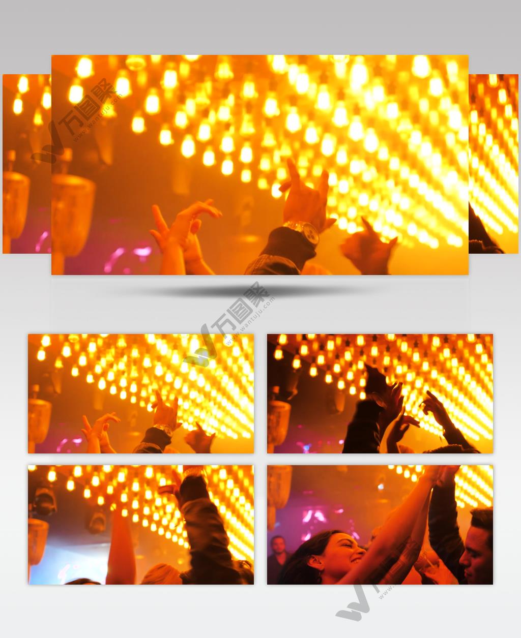 酒吧里舞池上人们高举双手蹦迪跳舞