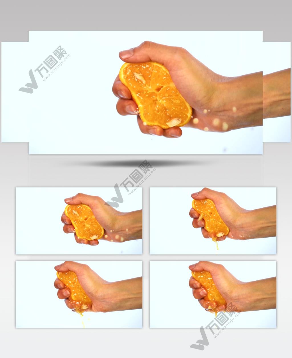 高清摄影用手挤压橙子水果