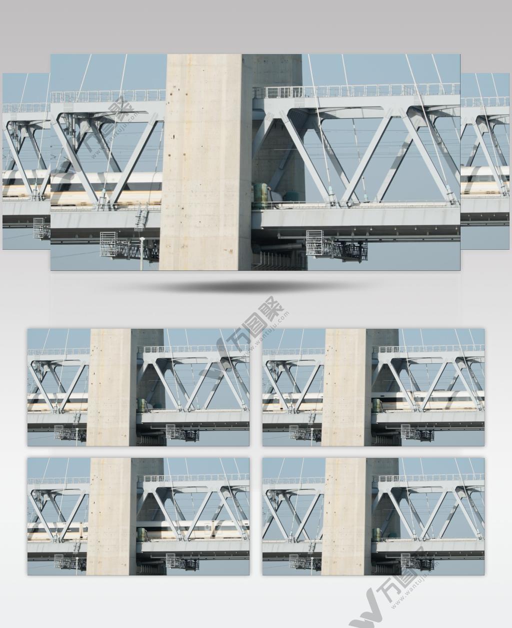 动车高铁火车飞速驶过高架桥铁路运输