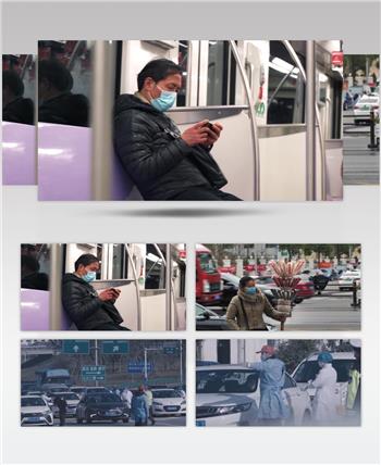 武汉疫情交警执勤卡点行人口罩街景