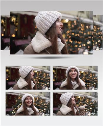 圣诞节的冬天下着雪花微笑的女人喜欢在街上散步张望
