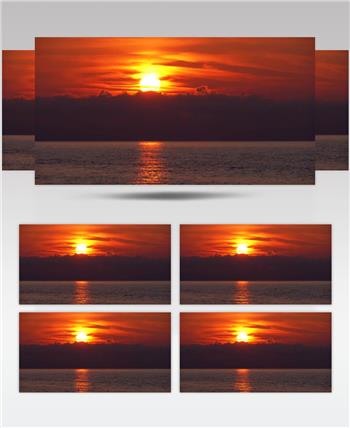 实拍海边黄昏下太阳落山的夕阳美景