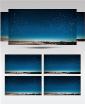 延时摄影夜晚星空在群山之上