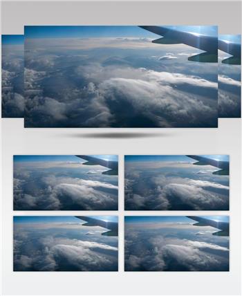 航拍从飞机窗口看云层下美丽的景色