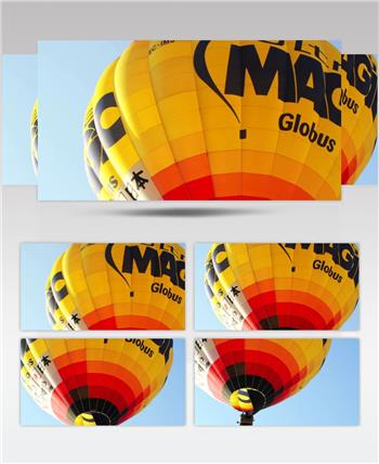 日本热气球节升起的暖色热气球