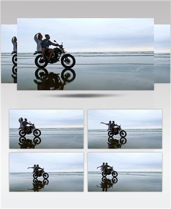 情侣在他们的海滩度假享受摩托车旅行