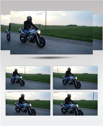 骑摩托车的人在乡间的路上