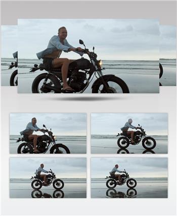 在海滩上骑摩托车男子