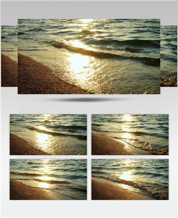 沙滩上的阳光反射和柔和的海浪