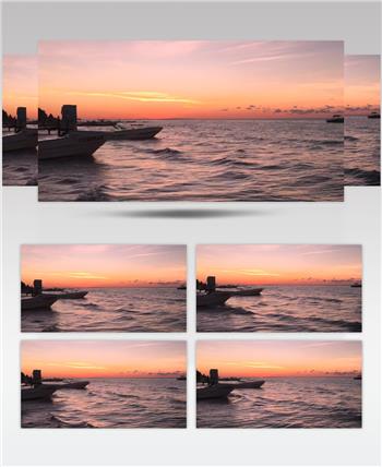 日落夕阳下的海上停靠的渔船