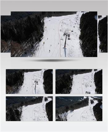 航拍雪山滑雪场游玩美景是实拍视频