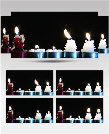 黑色背景上的圣诞蜡烛视频