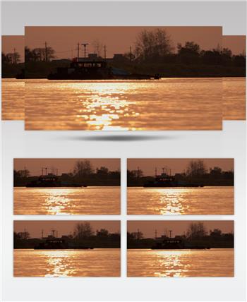 黄昏夕阳下的货船河道剪影