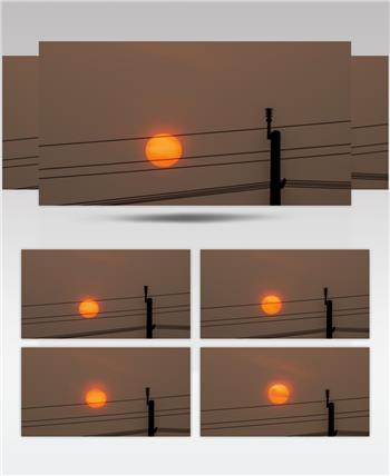 早晨太阳日出电线杆剪影延时实拍