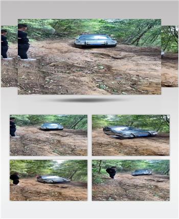 越野车在山路上泥潭里表演视频实拍