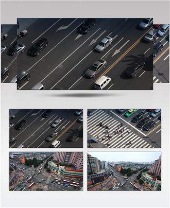 俯拍车辆行驶城市十字路口交通实拍背景视频