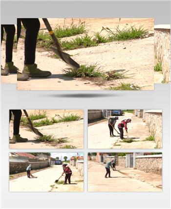 农村老人清理揭露杂草搞卫生