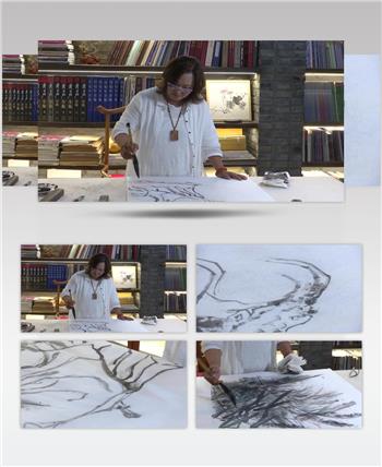 女书画家在家里用毛笔作画画画