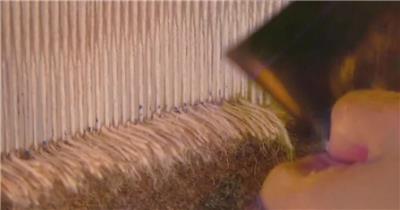 地毯厂织毯车间工人织地毯